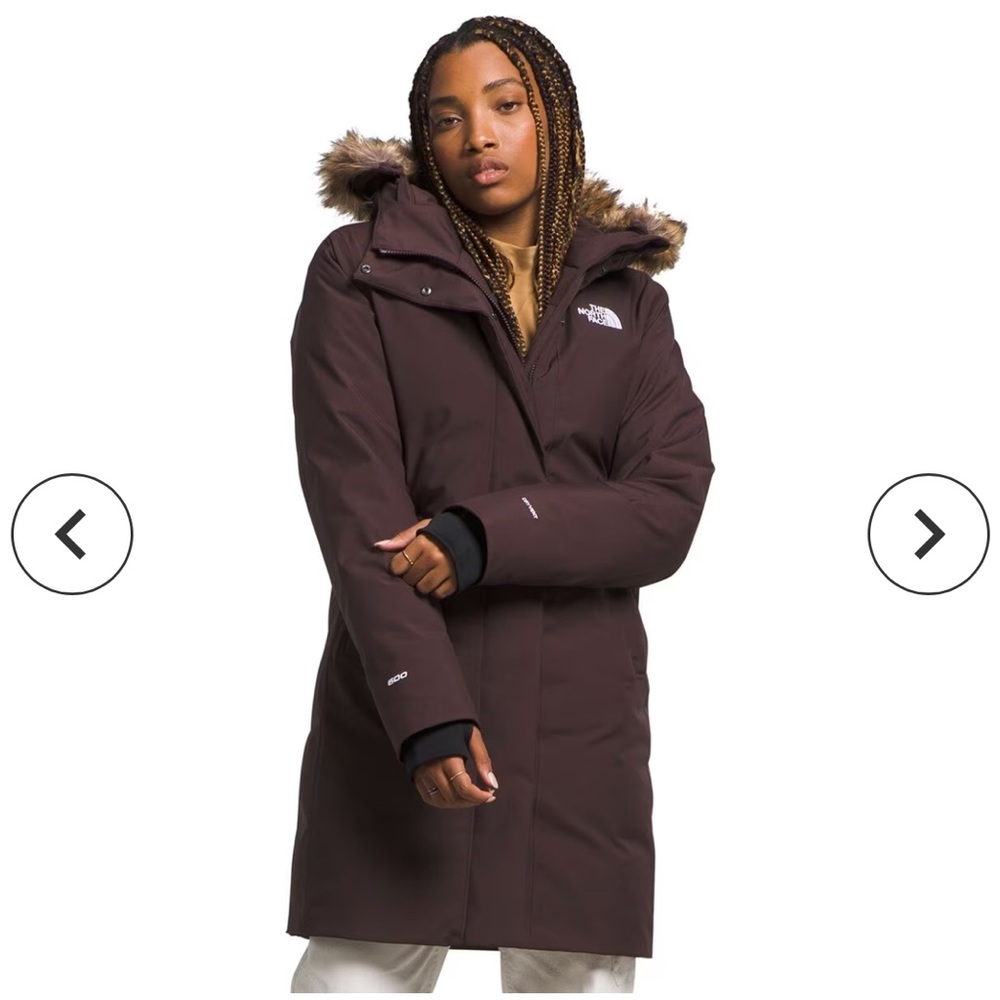 Maroon north face down parka with fur hood